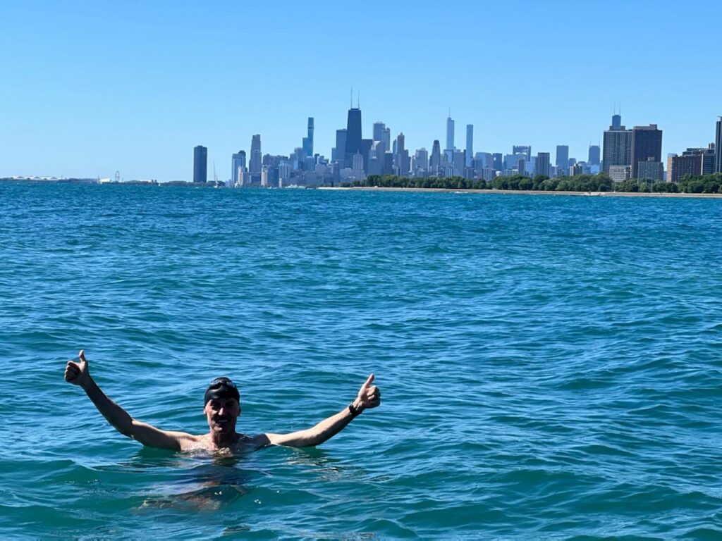 Chicago Skyline behind the open water swimming area at Montrose Ledge at Montrose Point