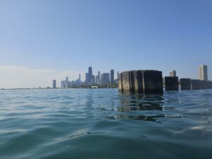 Only one Chicago Lake Michigan lakebed project piling juts out from the straight line open water swim guide